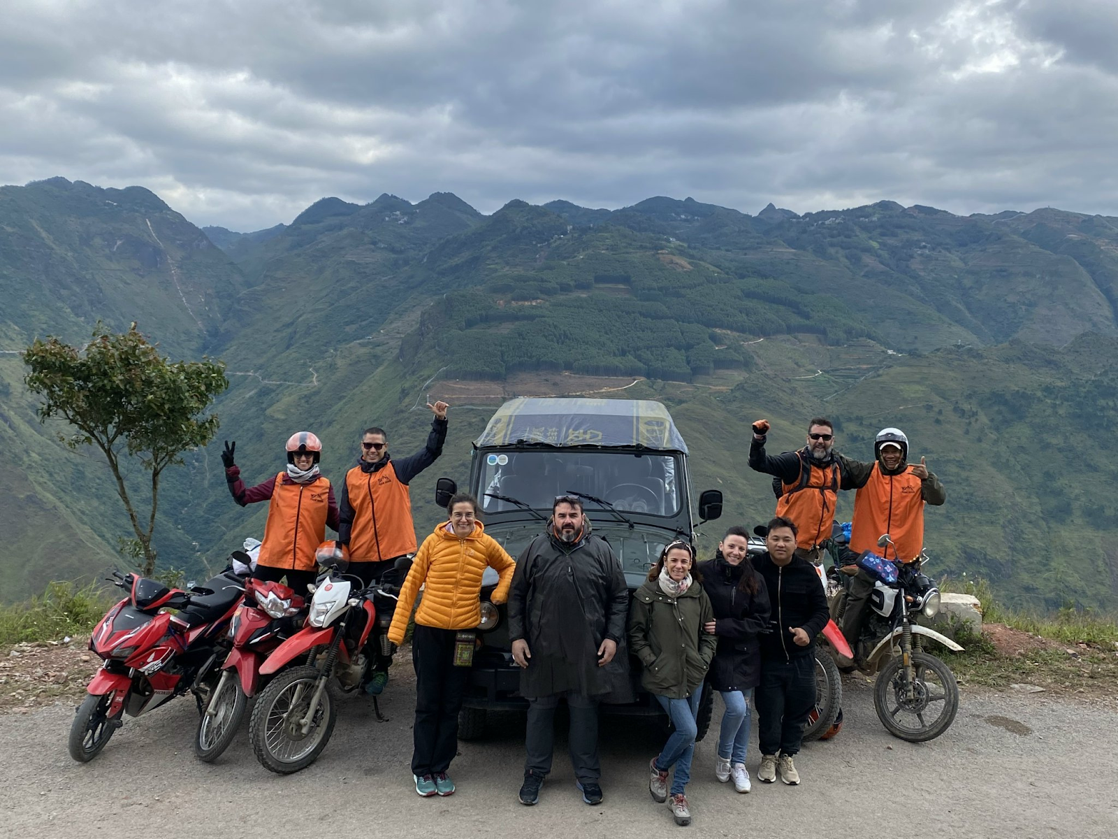 Ha Giang Jeep Tour with Local Guide driving through mountain roads in northern Vietnam