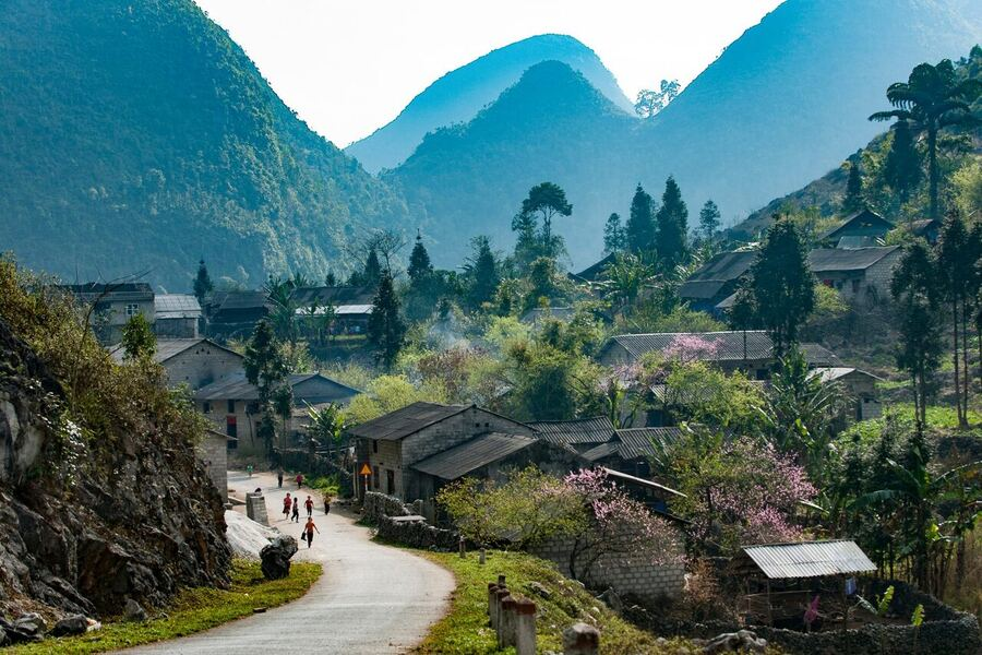 Local jeep on hidden road in Ha Giang Province Vietnam