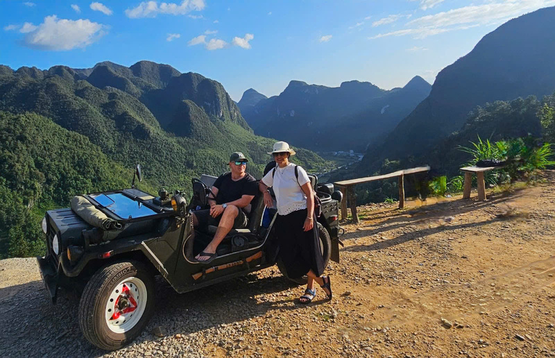  Jeep climbing the steep road of Ma Pi Leng Pass in Ha Giang Vietnam