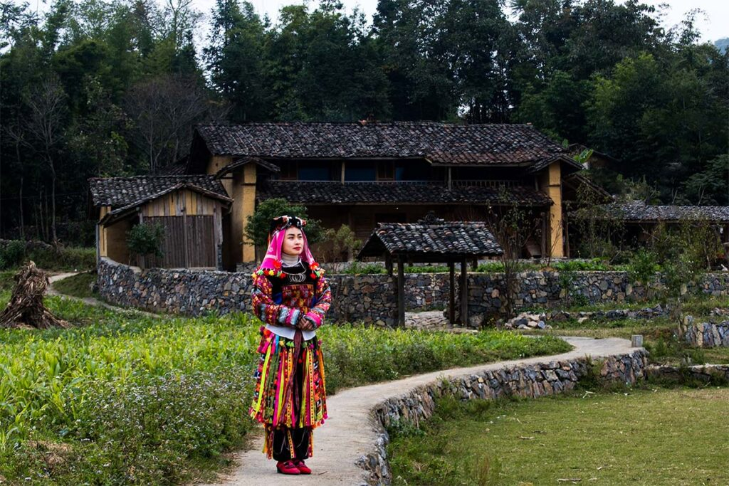 QT Motorbikes & Tours local guides sharing a meal with Ha Giang Jeep travelers