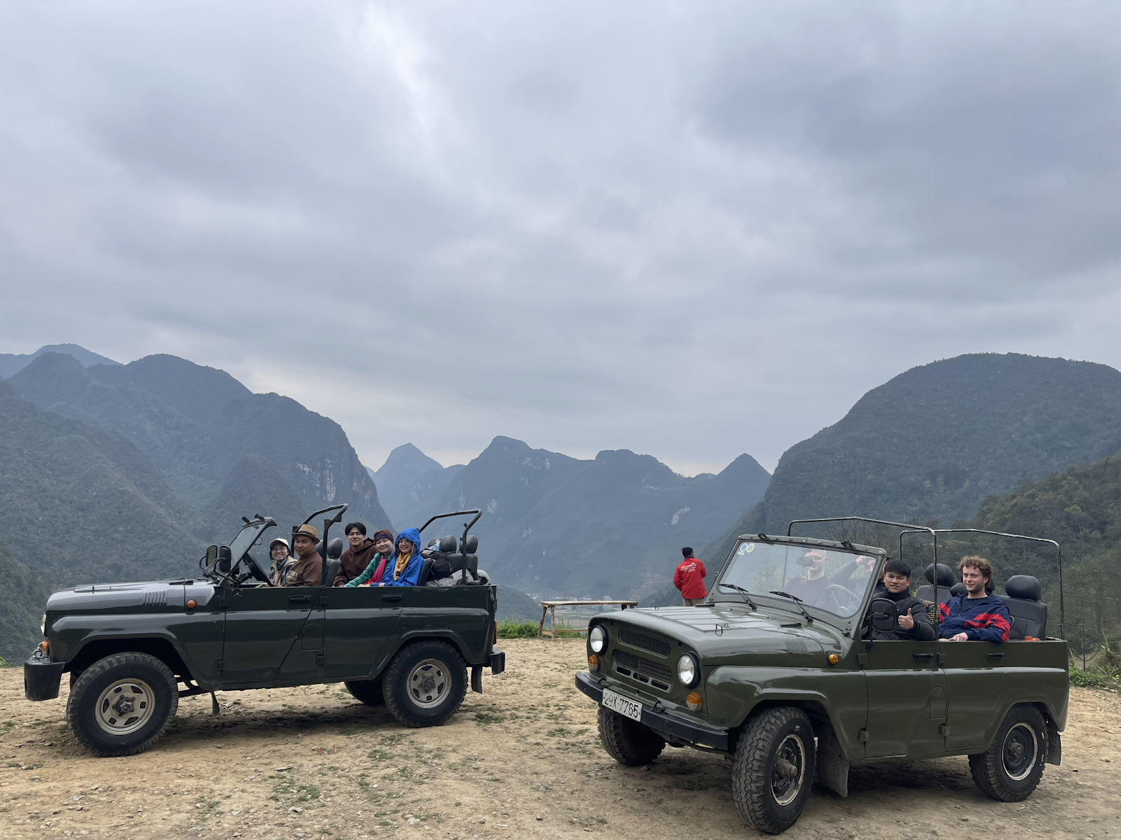 Ha Giang Loop Jeep Tour by QT on mountain road in northern Vietnam