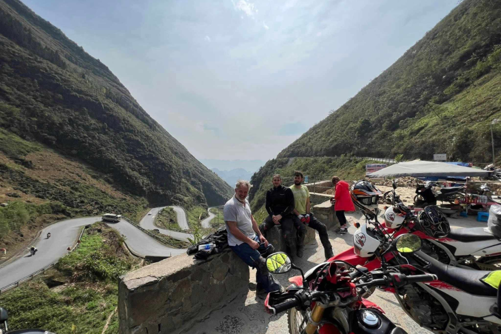 Motorbikes on the scenic road of Ma Pi Leng Pass, part of the Ha Giang Loop Motorbike Tour 4 days 3 nights