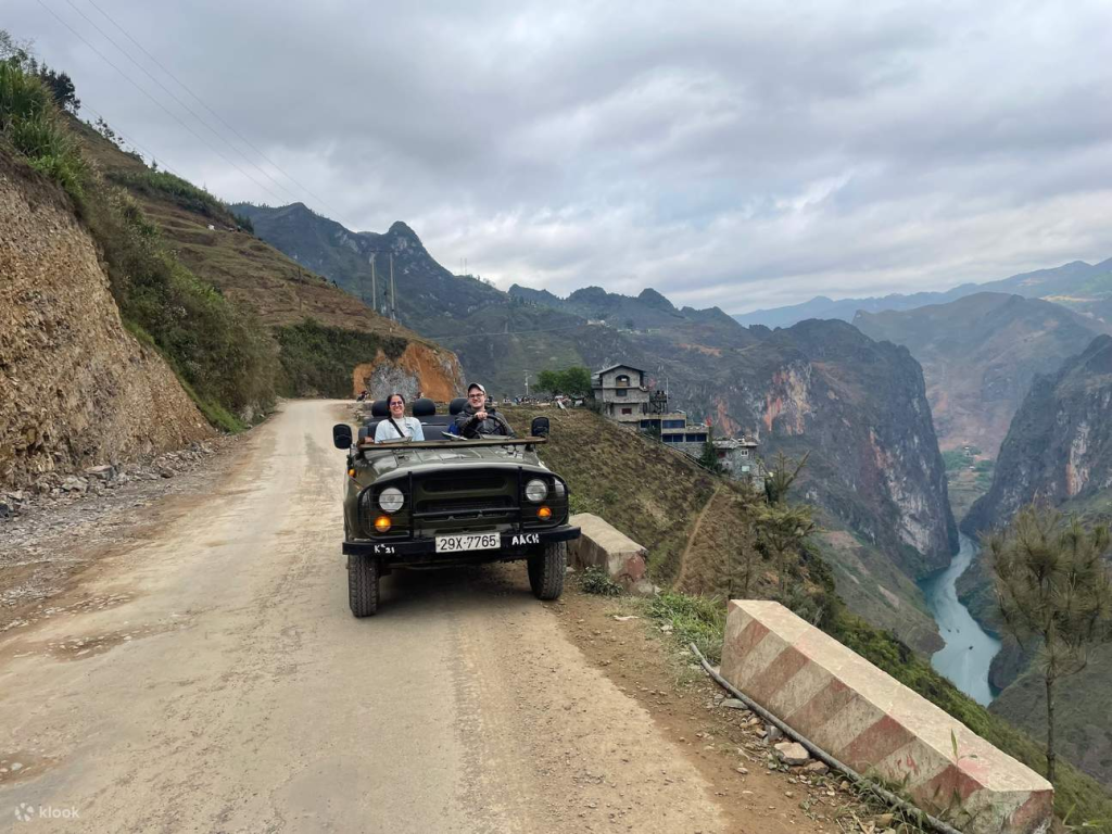 Private Ha Giang Jeep Tour crossing Ma Pi Leng Pass with Nho Que River below